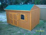 10' x 16' Garden shed in cedar with green shingles