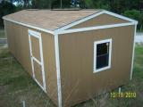 10' x 12' Utility shed in brown and white
