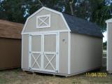 Tan and white with a Black roof